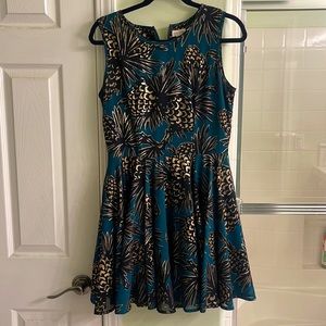 Teal black and gold sleeveless zip up cocktail dress